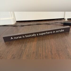 Hallmark Brown Nurse Superhero Sign